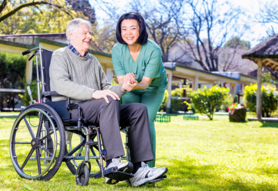 senior man with hospice staff